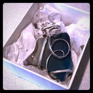 Blue agate pendant wrapped in silver tone metal